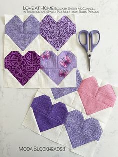 the book is about how to make heart quilts with love at home by sheri mcconnel and moda blockheads