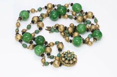 Louis Rousselet Paris 1950’s Green Glass Beads Necklace Vintage Green Evening Jewelry, Vintage Polished Beads For Jewelry Making, Vintage Green Faceted Beads, Green Beaded Evening Jewelry, Formal Green Beaded Necklace With Faceted Beads, Formal Green Faceted Beaded Necklaces, Vintage Large Green Beads, Vintage Green Beaded Necklace With Round Beads, Vintage Green Beads For Jewelry Making