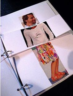 an open book with pictures of people in sandals on the pages and a binder attached to it