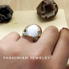 Handmade silver and gold plated ring with natural white stone agate. This is a perfect gift idea for mother, sister, and fish, sea animal lover) All our jewelry is made of high-quality sterling silver and has a stamp of 925 ▶RING SIZE: any size available (choose from the option) ▶RING WEIGHT: 11.2 gr ▶EARRINGS WEIGHT: 19.9 gr ▶EARRINGS LENGTH: 59 mm 1 inch = 25.4 mm 1 pound = 453.6 grams ⦿ Attention: The color of the stones may differ due to a difference between monitors ◦* ◦* ◦* ◦* ◦* ◦* ◦* ◦* Fine Jewelry White Cabochon Moonstone Ring, White Cabochon Moonstone Ring In Fine Jewelry Style, White Cabochon Moonstone Ring Fine Jewelry, Unique White Jewelry With Natural Stones, White Natural Stones Jewelry For Promise Ring, White Gemstone Open Ring, White Moonstone Open Ring, Handmade White Opal Ring In Sterling Silver, White Open Ring Jewelry For Promise