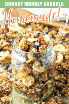 a glass jar filled with granola on top of a table