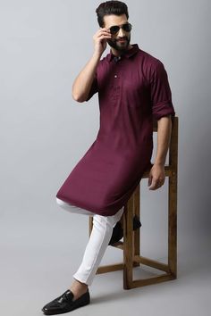 Solid Kurta with shirt collar Product Features: Color: Dark Maroon Fabric: Pure Cotton Work: Solid Style Type: Shirt Kurtas Sleeve Type: Full Sleeve Length: Short Kurta Collar Type: Mandarin Size Fit: Regular Fit Package Details: 1 Long Kurta Occasion: Festive Material Care Description: Machine wash Disclaimer: There will be slight difference in digital to actual image Kurta Top, Maroon Fabric, Long Kurta, Short Kurta, Dark Maroon, Cotton Kurta, Maroon Color, Traditional Indian, Shirt Collar