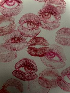 the lips are drawn on paper with red ink