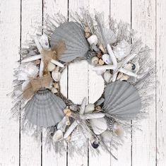 a wreath made out of shells and seashells