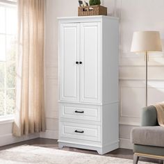 a white armoire in a living room