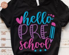 a black shirt with the words hello pre school on it and stars in pink, blue, and purple