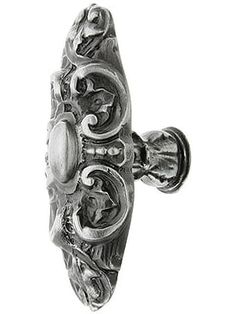 an ornate door handle on a white background