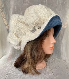 Cozy winter  newsboy cap made out of Sherpa fabric combined with blue denim decorated with little charms . Not Lined .So cozy and warm . Mannequin head size is 21 , will fit 22,-23,5 inches created as one of a kind.Feel free to email me any questions. Thanks. Casual Winter Cloche Hat One Size, Casual Handmade Cloche Hat For Winter, Casual Cream Cloche Hat For Winter, Casual Handmade Winter Cloche Hat, White Casual Cloche Hat For Winter, Cream Cotton Winter Hats, Denim Cap, Sherpa Fabric, Mannequin Head