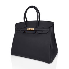 Hermes Birkin 35 bag features limited edition Plomb (Off Black).Lush with coveted gold hardware. Hermes naturally textured togo leather is supple and scratch resistant. A rare Birkin bag due to the scarcity of this elegant off black color.Comes with lock, keys, sleepers, raincoat and signature Hermes box. NEW or NEVER .Mightychic has offered exquisite Hermes selections for 22 years matched with unrivaled personal service.final sale BAG MEASURES:LENGTH 35 cm / 14"TALL 25 cm / 10"DEEP 18 cm / 7" HANDLES:TALL 5" CONDITION:NEW or NEVER Will be delivered with Box, dust bag, card, booklet and receipt Exchange Accepted in this cases :/p> Rare Birkin, Hermes Birkin 35, Ysl Shoes, Hermes Shoes, Togo Leather, Fendi Shoes, Louis Vuitton Shoes, Off Black, Gucci Shoes