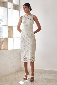 Shop for Mishru Ivory Averi Floral Embroidered Midi Dress for Women Online at Aza Fashions Elegant Sleeveless Midi Dress With Floral Applique, Floral Embroidered Midi Lace Dress For Wedding, Sleeveless Lace Dress With Floral Applique For Wedding, Fitted Midi Dress With Floral Applique For Wedding, Midi Length Floral Applique Wedding Dress, Sleeveless Lace Wedding Dress With Floral Applique, White Lace Tea-length Dress, Cream Sleeveless Dress With Floral Applique, White Knee-length Dress With Lace Bodice