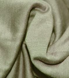 a close up view of a green fabric