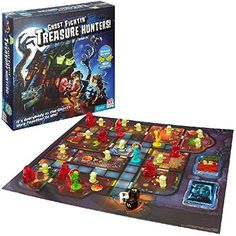 a board game with an image of the creature hunter on it and its contents in front