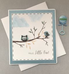 a card with two little owls sitting on a tree branch and the words hello little owl