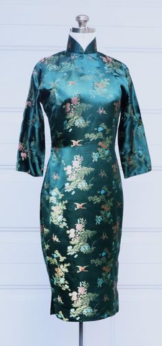 Vintage 60's Chinese custom made long sleeve silk QiPao dress color green, In good vintage condition, Some light stains on the collar ( inside ). It' 100% silk. Weighs 11 Oz. ( the owner used living in Taiwan back 60'sto 70's. ) Thanks. Ship US only I'll add more pictures soon. Collar 14" Fits like: M ? Shoulder: 15" Bust: 33" Waist: 28" Hips: 34" Full Length: 42" Dark Green Fitted Long Sleeve Dress, Green Long Sleeve Formal Dress For Spring, Spring Green Long Sleeve Formal Dress, Green Long Sleeve Dress For Spring Formal, Dark Green Long Sleeve Formal Dress, Green Silk Dress For Spring Formal Occasion, Formal Green Silk Dress, Green Silk Dress For Spring Formal, Green Silk Dress For Formal Occasions