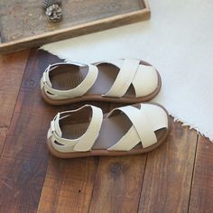 Beige T-strap Sandals With Round Toe For Beach, Beige Round Toe T-strap Sandals For Beach, Beige T-strap Sandals For The Beach, Cream Sandals With Buckle Closure And Round Toe, Cream Closed Toe Slingback Sandals For Summer, Cream Round Toe Sandals With Buckle Closure, Beige Adjustable T-strap Sandals With Round Toe, Adjustable Beige T-strap Sandals With Round Toe, Beige Closed Toe T-strap Sandals For Beach