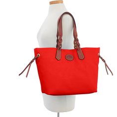 Lighten Up    This lightweight tote, made from maintenance-free nylon, is perfect for anyone who needs a bag that won't slow them down. Casual Waterproof Shopping Bags, Casual Waterproof Bags For Shopping, Casual Nylon Bags With Leather Handles, Casual Nylon Bag With Leather Trim, Casual Red Waterproof Bags, Dooney And Bourke Disney, Canvas Leather Tote, Canvas Leather Bag, Dooney & Bourke Bag