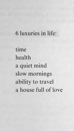 an open book with the words 6 luxurious in life time health a quiet mind slow mornings ability to travel a house full of love