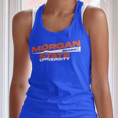 "Custom & Vintage Morgan State Bears HBCU College Apparel, Graphic Tees, Hoodies, Sweatshirts, and More Morgan State Apparel For Both Morgan State Students and Morgan State Alumni. Black owned, HBCU alumni operated apparel company specializing in academic wear. This Morgan State Bears product is handmade in Atlanta, GA with materials purchased from local Atlanta vendors. We use only the best material, printing, and packaging. Orders typically ship much faster than posted timeframes.  Ladies Tanks Are Relaxed Racerback Tanks (or regular/traditional size). Do Not order a size down because they are not baggy relaxed. Essentially the tanks just are not fitted (tight) to the body. If you would like a fitted style, please email us or add to the notes during checkout.  We Use Bella + Canvas (B640 Collegiate Stretch Tops For Sports Events, Collegiate Blue Sleeveless Tops, Blue Racerback Top With Graphic Print, Blue Sleeveless Collegiate Tops, Sportswear Racerback Tops For Sports Events, Sportswear Tops For Sports Events With Racerback, Blue Sleeveless Collegiate Style Top, Sleeveless Blue Tops For College, Team Spirit Racerback Sports Top