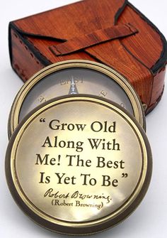 an open wooden box with a quote on the front and inside that reads, grow old along with me the best is yet to be