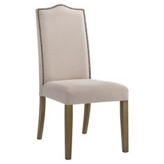 the side view of a dining chair with an upholstered back and nail trimming