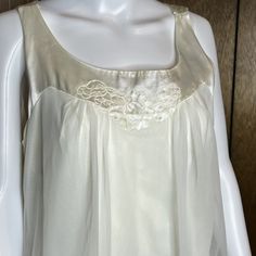 60s Vintage Gossard Artemis white double layer chiffon & nylon nightgown Tag is size Medium but it is quite generous fit (21" armpit to armpit and 34" shoulder to hem). It's very flowy. Absolutely gorgeous satin trim flower detail on front and wide satin band  bottom hem. One owner. Good condition. White Silk Wedding Nightgown, Silk Nightgown For Summer Wedding, Sheer White Nightgown For Parties, Sleeveless Cream Nightgown For Wedding, Sheer Sleeveless Nightgown For Party, Sheer Nightgown For Spring Wedding, White Sleeveless Nightgown For Party, White Sleeveless Party Nightgown, Spring Wedding Sheer Nightgown