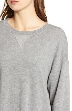 A versatile staple, this sporty pullover is made in a luxe blend of supersoft fibers and has a heathered finish that goes with everything. Crewneck Long sleeves 62% rayon, 30% cotton, 5% spandex, 3% polyester Machine wash, tumble dry Imported t.b.d. Gray French Terry Tops With Ribbed Cuffs, Heather Grey Athleisure Sweatshirt For Fall, Heather Grey Crew Neck Sweats For Loungewear, Comfy Gray Top With Ribbed Cuffs, Sporty Heather Grey Sweater With Ribbed Cuffs, Gray Relaxed Fit Athleisure Sweater, Casual French Terry Tops For Layering, Athletic Heather Crew Neck Sweatshirt For Loungewear, Heather Grey Athleisure Sweats For Fall