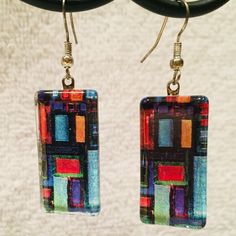 New Without Tag - Never Worn, With Original Gift Box. Artisan Glass Earrings Featuring Contemporary Color Block Design. 1 1/8" Long X 5/8" Wide + Hook, Which Hangs 3/4". Beautiful, Vibrant Colors! From Illness/Smoke/Pet-Free Home. Modern Multicolor Rectangular Jewelry, Artsy Colorful Earrings For Gift, Artsy Colorful Earrings As Gift, Artsy Colorful Earrings For Gifts, Hand Painted Multicolor Modern Earrings, Modern Colorful Handmade Jewelry, Handmade Modern Multicolor Earrings, Colorful Earrings As A Gift, Handmade Artistic Rectangular Earrings