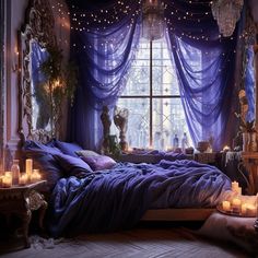 a bedroom with candles lit up in front of the window