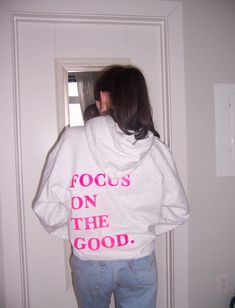 Introducing our Focus on the Good Hoodie! With a relaxed fit and cozy hood, it's perfect for lounging at home, spreading positivity on the go, or a sunset at the beach! Elevate your style and spread positivity with our new handmade hoodie ☻ ✿ True colors are shown in the last photo ✿ All sizes are unisex. If you have any questions please let me know! Please read/view shop policies and full listing before purchasing. Thank you so much! ✿ CARE For washing, turn inside out and wash with cold water. Hang your item to dry. When ironing, turn item inside out and iron. Do not iron on the design unless it is inside out. Tags: Cute hoodie, aesthetic, trendy, saying on back, gift for her, words on back, crewneck, womens sweatshirt, college, sorority, be kind, pinterest Cozy Fit Hoodie With Letter Print, Trendy Cozy Fit Hoodie With Crew Neck, Relaxed Fit Text Print Hoodie For Loungewear, Trendy Crew Neck Hoodie With Cozy Fit, Cozy Fit Hoodie With Letter Print For Streetwear, Gray Graphic Print Hoodie For Loungewear, Fall Text Print Hoodie For Loungewear, Casual Slogan Hoodie For Loungewear, Cozy Letter Print Hoodie Sweatshirt