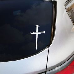 a cross on the side of a car