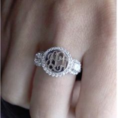 "Monogrammed Sterling Silver Ring with CZ'S This ring is a stunner! Loaded with CZ's. It's very striking and looks beautiful with a Monogram Details CZ's Around the face of the ring and part of the way down the band Engravable face measures approximately 0.40\" and the face with the cz's measurers approximately 0.5\" Sterling Silver with CZ's Available in Sizes 5-10 Can be engraved with a Single Initial or a Monogram Thanks so much!" White Gold Diamond Initial Ring With Monogram, Diamond Monogram Initial Ring For Promise, Classic Initial Ring In Cubic Zirconia As Gift, Classic Initial Ring With Cubic Zirconia As Gift, Classic Cubic Zirconia Initial Ring As Gift, Diamond Rings With Initials, Classic Cubic Zirconia Jewelry With Initials, Initials Engraved Diamond Ring, Silver Monogram Engraved Ring For Wedding