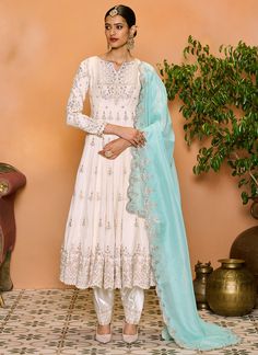 Off White Embroidered Anarkali Style Punjabi Suit Anarkali Chinon Churidar In Traditional Drape, Cream Silk Anarkali Set, Semi-stitched Anarkali Salwar Kameez In Cream, Semi-stitched Cream Anarkali Salwar Kameez, Anarkali Cream Salwar Kameez Semi-stitched, Cream Anarkali Salwar Kameez Semi-stitched, Anarkali Salwar Kameez In Cream, Silk Embroidered Churidar For Reception, Festive Anarkali Salwar Kameez In Cream