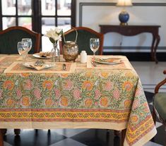 the table is set for two with place settings