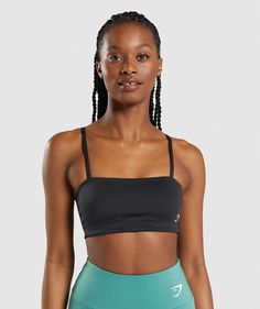 FOR YOU, FOR YOURS Perfect for lifting or lounging, the Bandeau is your new go-to low support sports bra. With a sleek design, adjustable straps and a removable cups, it’s perfect for those days you don’t need a lot of support but want a lot of style.   - Low support bandeau- Square neck - Adjustable straps- Removable padding- Logo to hem- 78% Polyester, Gymshark Sports Bra Black, Gymshark Bandeau, Gym Bra, Gym Workouts Women, Gym Workout Outfits, Sports Bra Top, Gymshark Women, Athletic Gear, Bandeau Bra