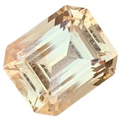 an orange diamond is shown on a white background