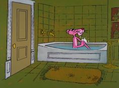 a pink cartoon character sitting in a bathtub