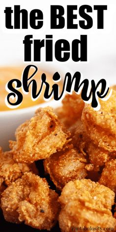 fried shrimp with dipping sauce in the background and text overlay that reads, the best fried shrimp