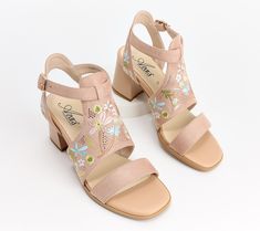 If you're a romantic at heart, you'll absolutely love the way that these embroidered heeled sandals bring a graceful elegance to any outfit. From Azura by Spring Step. Summer Floral Embroidered Heels, Floral Embroidery Block Heels For Summer, Elegant High Heel Embroidered Sandals, Elegant Embroidered Open Toe Sandals, Embroidered Open Toe Heels For Spring, Floral Embroidered High Heels For Summer, Spring Embroidered Open Toe Heels, Elegant Open Toe Heels With Floral Embroidery, Spring Floral Embroidered Block Heels