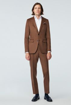 On trend and to the point, our Jevington Melange is a reliable choice for the season. Its 100% wool composition keeps it weighed and sustainable while the milk chocolate hue speaks to current color trends. Gray Suits, Suits Black, Blue Suits, Brown Suit, Custom Suits, Cashmere Fabric, Brown Blazer, Brown Suits, Custom Suit