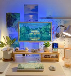 a desktop computer sitting on top of a desk next to a keyboard and mouse pad