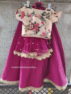 Product: Custom made girl kids dress. Fabric: Lehenga- silk with gota work border Top -printed chanderi silk Dupatta - net embroidered Delivery Time : Please keep me informed for any dates or times frame you keeping in mind. Chanderi Sharara For Festivals, Purple Art Silk Dress For Navratri, Pink Art Silk Dress With Gota Work, Fitted Purple Dola Silk Dress, Festival Purple Dola Silk Dress, Designer Wear Dupatta For Diwali, Festive Saree With Pallu Detail, Purple Gota Work Dress For Diwali, Purple Gota Work Dresses For Navratri