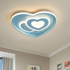 there is a heart shaped light on the ceiling