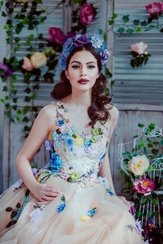 two different images of a woman in a dress and flowers on her head, with the same