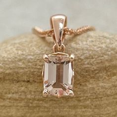 This Emerald Cut Morganite Pendant is part of our Lola Collection, which is characterized by a gorgeous, genuine gemstones held in place atop a Filigree Setting. Center Stone: Genuine AAA Peachy Pink Morganite, Emerald Cut, averaging 7x5mm and 0.90 carat. All shapes, sizes and gemstones available upon request! Chain sold separately. BUY THE CHAIN HERE: https://www.etsy.com/shop/LaurieSarahDesigns?ref=seller-platform-mcnav§ion_id=5874586 For those ordering in 18k Rose Gold, pendant is 18k, bail i Classic Rose Gold Gemstone Jewelry, Classic Faceted Gemstones As Gifts, Classic Faceted Gemstones For Gift, Classic Jewelry With Birthstones For Jewelry Making, Morganite Pendant, Family Women, Filigree Jewelry, Pink Morganite, Rose Gold Pendant