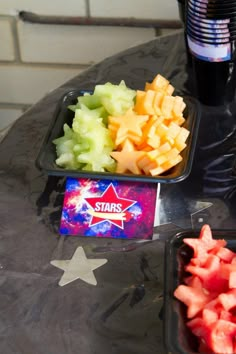 there are many different types of food on the table together, including grapes and watermelon