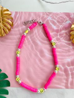 This necklace is waterproof so it's perfect for summer! It is 14 inches long and has a 2-inch extender chain so it can be adjusted to be 14-16 inches long! Playful Adjustable Necklaces For The Beach, Playful Summer Beach Necklaces, Playful Summer Beach Necklace, Pink Adjustable Necklace For Friendship, Playful Pink Necklaces For Festivals, Cute Adjustable Beach Necklaces, Fun Summer Necklaces For Gifts, Trendy Pink Beaded Necklaces For Summer, Playful Pink Necklace For Festival