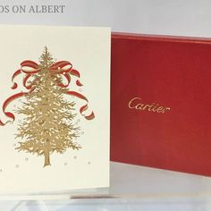 a card with a christmas tree on it