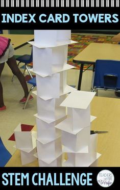 a tower made out of paper sitting on top of a table