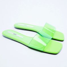 Nwt Zara Vinyl Slide Sandals In Color Bright Green. Slide Sandals With Wide Vinyl Strap At Front. Featuring Technical Flexible Latex Foam Insole Designed To Offer Increased Comfort. Heel Height: Approximately 1.27 Cm / .5” Composition: Upper 100% Polyurethane Thermoplastic Sole 100% Polyurethane Thermoplastic Insole 100% Polyurethane Thermoplastic Trendy Green Open Toe Jelly Sandals, Trendy Green Flat Flip Flops, Green Open Toe Jelly Sandals For Vacation, Green Flat Jelly Sandals For Beach, Trendy Green Flat Sandals, Summer Vacation Green Jelly Sandals, Green Flat Heel Flip Flops For Summer, Green Open Toe Jelly Sandals For Summer, Zara Green Sandals For Summer