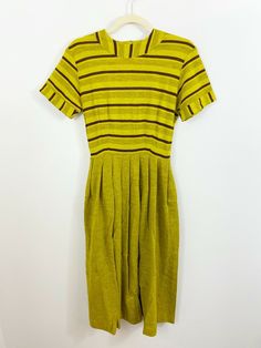 Vintage Jo Dee Striped Short Sleeve Dress NO SIZE Green Side Zip Pleated 70s 60s Good vintage condition - does have slight discoloring under each arm Maybe 60s or 70s???  Mad Men, Secretary NO BELT, side zip Measurements lying flat:  pit to pit 16", waist 12", hips 29", length 44" Smoke and pet free home Retro A-line Vintage Dress For Work, Retro Striped Knee-length Dress, Lined Retro Vintage Dress, Retro Green Dress For Work, Vintage Short Sleeve Striped Dress, Retro Striped Midi Dress, Green Retro Vintage Dress With Short Sleeves, Retro Vintage Short Sleeve Workwear Dress, Retro Short Sleeve Vintage Dress For Work